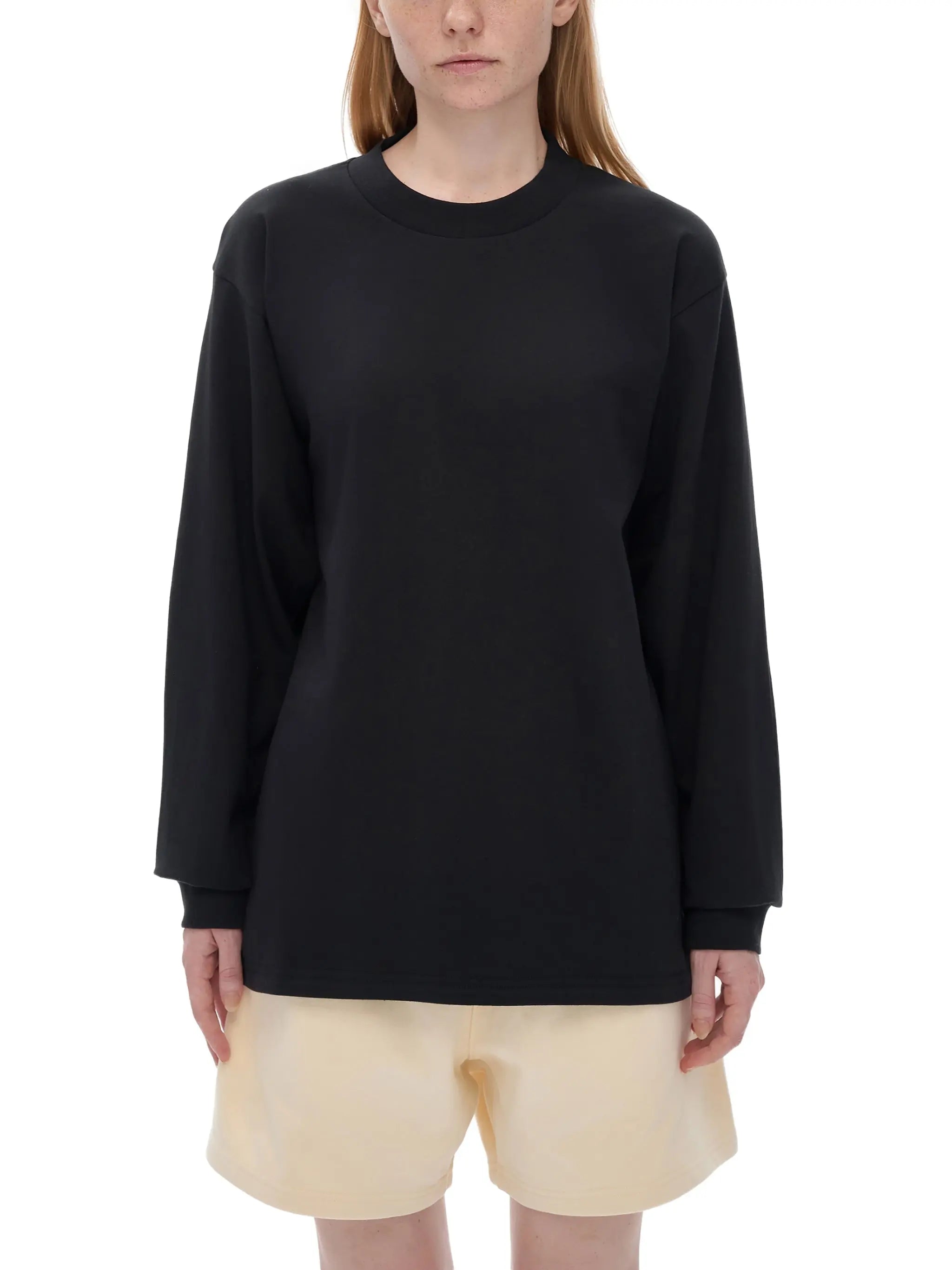 Person wearing 222 angel number cotton t-shirt, spiritual manifestation clothing for balance and harmony
