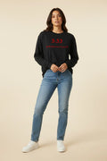 Latina woman 3:33 long sleeve